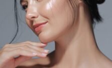 Woman with naturally glowing skin in soft natural light